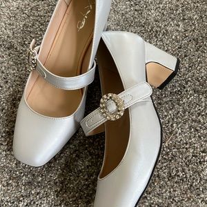 Silver MaryJane heels